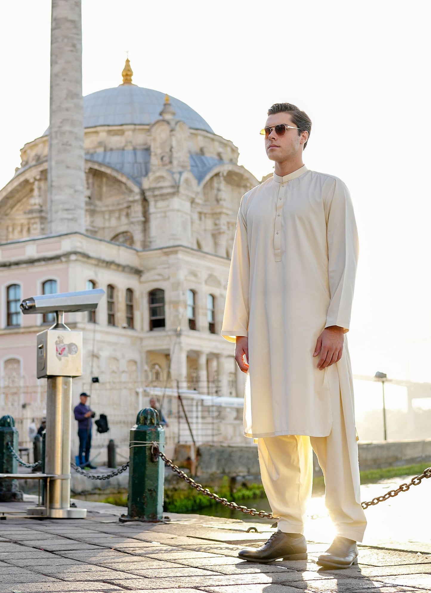 SGF Ephesus Cream premium fabric — elegant men’s cream outfit styled in front of mosque, unstitched shalwar kameez fabric Pakistan.