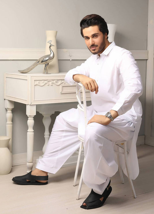 Sheikh Gulzar Fabrics SoftLattha™ White Edition — lifestyle shot of model in white shalwar kameez, premium unstitched cotton fabric Pakistan.