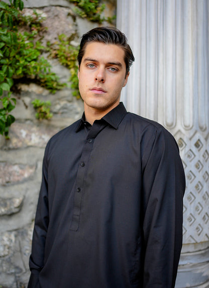 Istanbul Noir by SGF — portrait close-up of model in premium black outfit, luxury unstitched men’s fabric Pakistan.